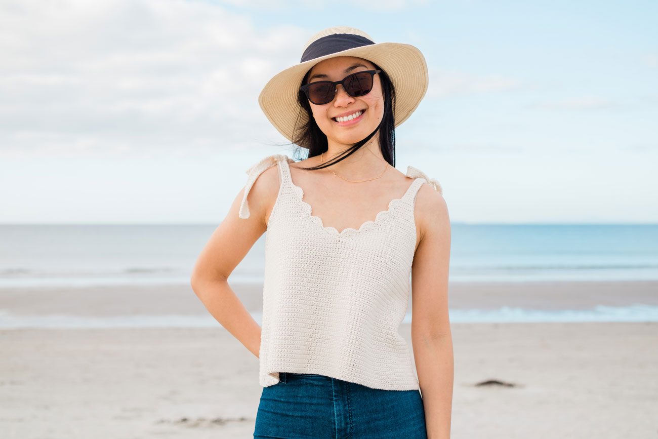 Woman wearing a sun hat at the beach