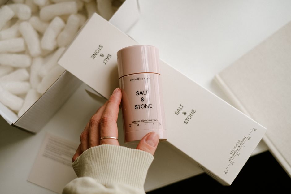 Elegant skincare packaging showcasing Salt & Stone deodorant with a cozy, minimal aesthetic.