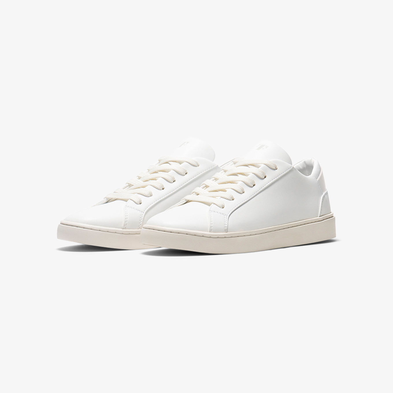 White Thousand Fell sneaker detail for a minimal outfit